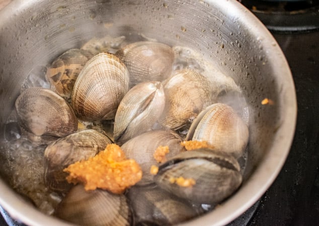 miso clams in pan