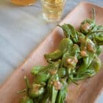 miso padron peppers recipe on brown plate with whisky