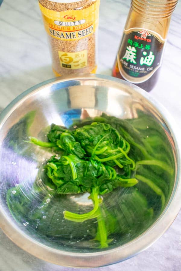 korean sesame spinach ready to mix in bowl