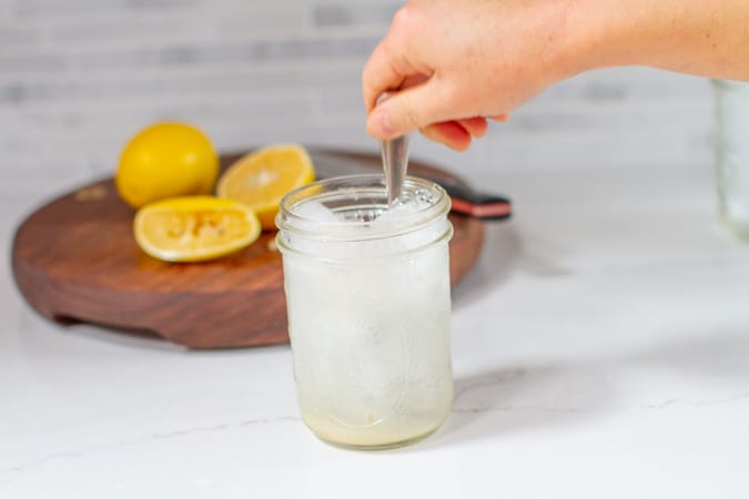 vietnamese lemon soda stirred with a spoon
