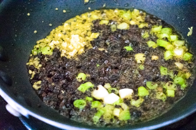Black bean sauce sizzling in pan