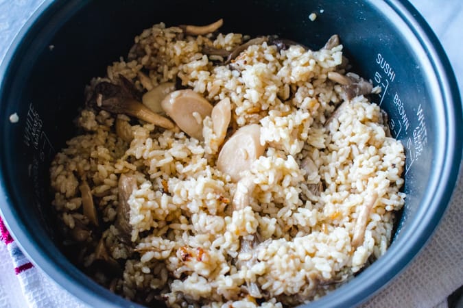 rice cooker filled with kinoko gohan