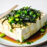 Vegan Hiyakko Tofu on a blue plate with chopsticks