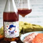 Clementine wine with a plate of sashimi