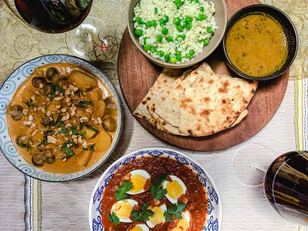 a meal of curries paired with mudgee red wine
