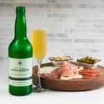 Mayador still cider with a charcuterie board